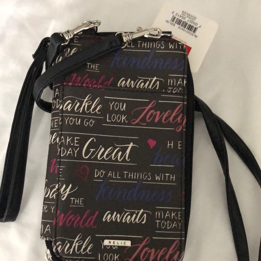 Crossbody or wristlet phone purse license credit cards etc.